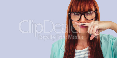 Composite image of happy smiling hipster with a mustache