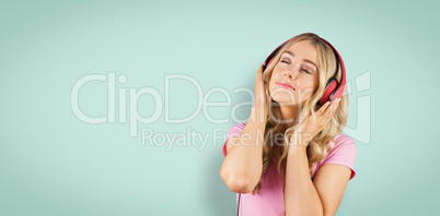 Composite image of pretty young woman with headphones