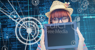 Composite image of attractive hipster woman behind a tablet