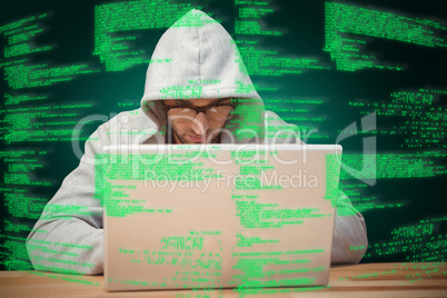 Composite image of creative businessman with hooded shirt workin