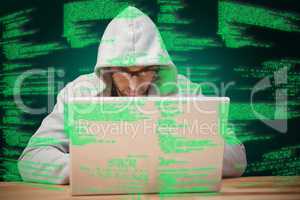 Composite image of creative businessman with hooded shirt workin