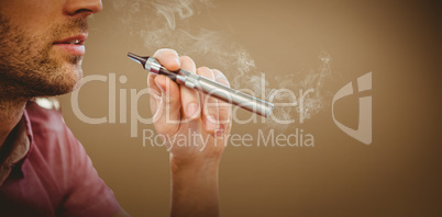 Composite image of cropped image of man smoking electronic cigar