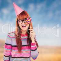 Composite image of smiling hipster woman with lollipop and hat p