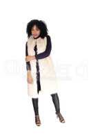 African American woman in fur coat.