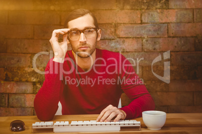 Composite image of portrait of confident man wearing eye glasses