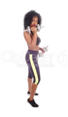 African American woman with dumbbell's.