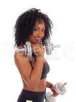 Closeup of African American woman with dumbbell's.