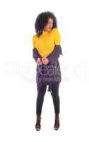 African American woman in yellow sweater.