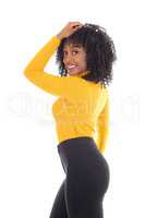 African American woman in yellow sweater.