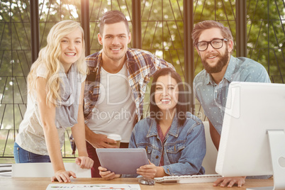 Composite image of portrait of smiling business professionals us