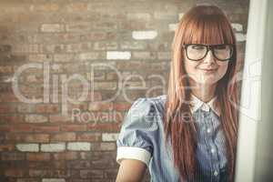 Composite image of attractive smiling hipster woman posing