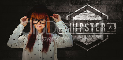 Composite image of attractive smiling hipster woman with hat