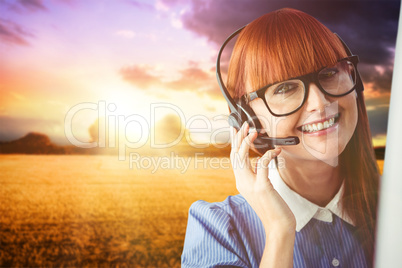 Composite image of attractive hipster woman with headset