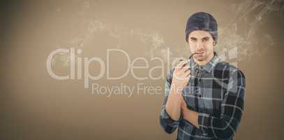 Composite image of portrait of confident hipster smoking pipe