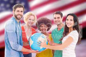 Composite image of young creative business people with a globe