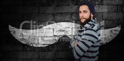 Composite image of portrait of confident hipster with hooded shi