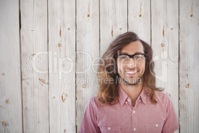 Composite image of happy hipster wearing eye glasses