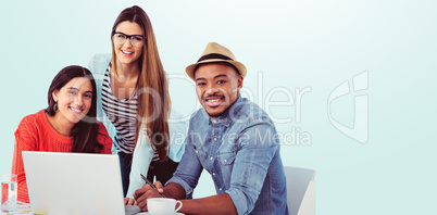 Composite image of young creative team having a meeting Composite image of young creative team having a meeting