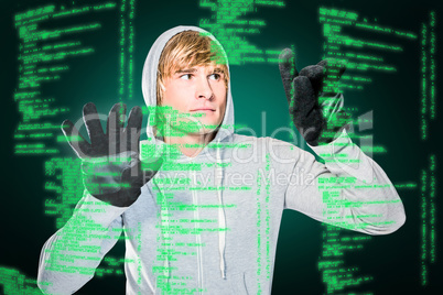 Composite image of man with black gloves hitting glass