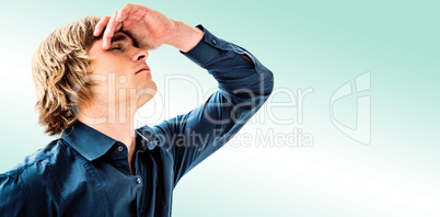 Composite image of troubled hipster businessman holding his head Composite image of troubled hipster businessman holding his head