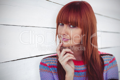 Composite image of portrait of a smiling hipster woman