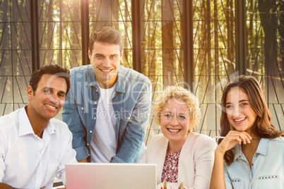 Composite image of group of young colleagues having a meeting