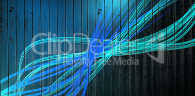 Composite image of curved laser light design in blue