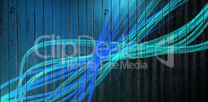 Composite image of curved laser light design in blue