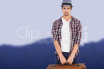 Composite image of confident man holding briefcase