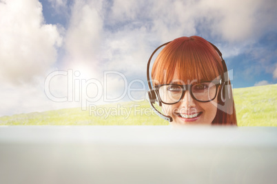 Composite image of attractive hipster woman with headset