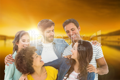 Composite image of group portrait of happy young colleagues