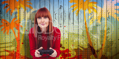 Composite image of smiling hipster woman playing video games