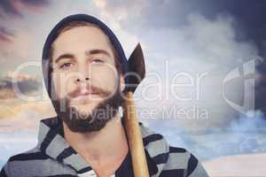 Composite image of close-up portrait of hipster with hooded shir