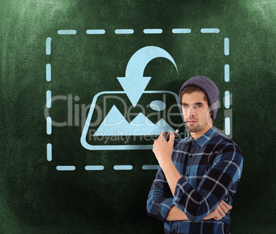 Composite image of portrait of hipster holding smoking pipe