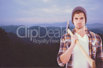 Composite image of portrait of hipster holding axe on shoulder