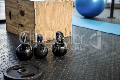 kettlebells and wooden block