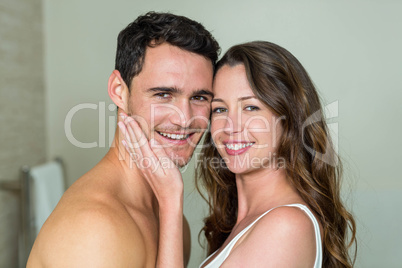 Portrait of young couple smiling