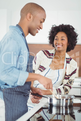 Happy couple cooking together