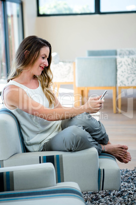 smiling woman on her mobile phone