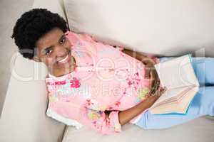 Pregnant woman reading a book