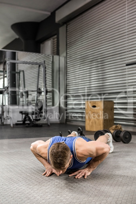 Muscular man doing push up