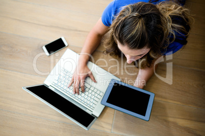 business woman on a laptop and a tablet