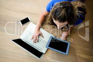 business woman on a laptop and a tablet