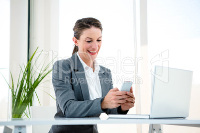 smiling business woman on the phone