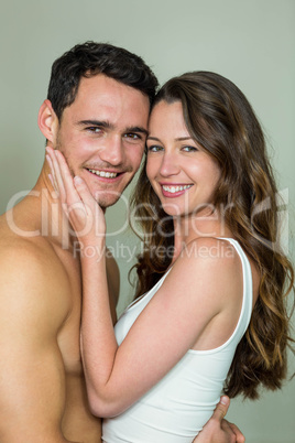 Portrait of young couple smiling