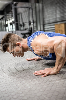 Muscular man doing push up