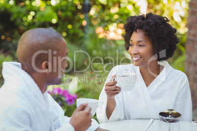 Happy couple having breakfast