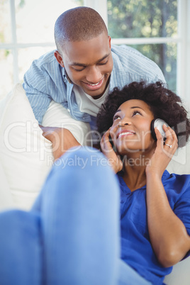 Smiling couple in living room