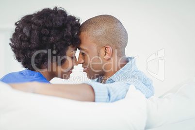 Portrait of smiling couple on the sofa