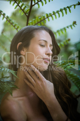 Beautiful woman standing outdoors in garden